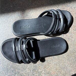 Olukai Black Elevated Leather Slides